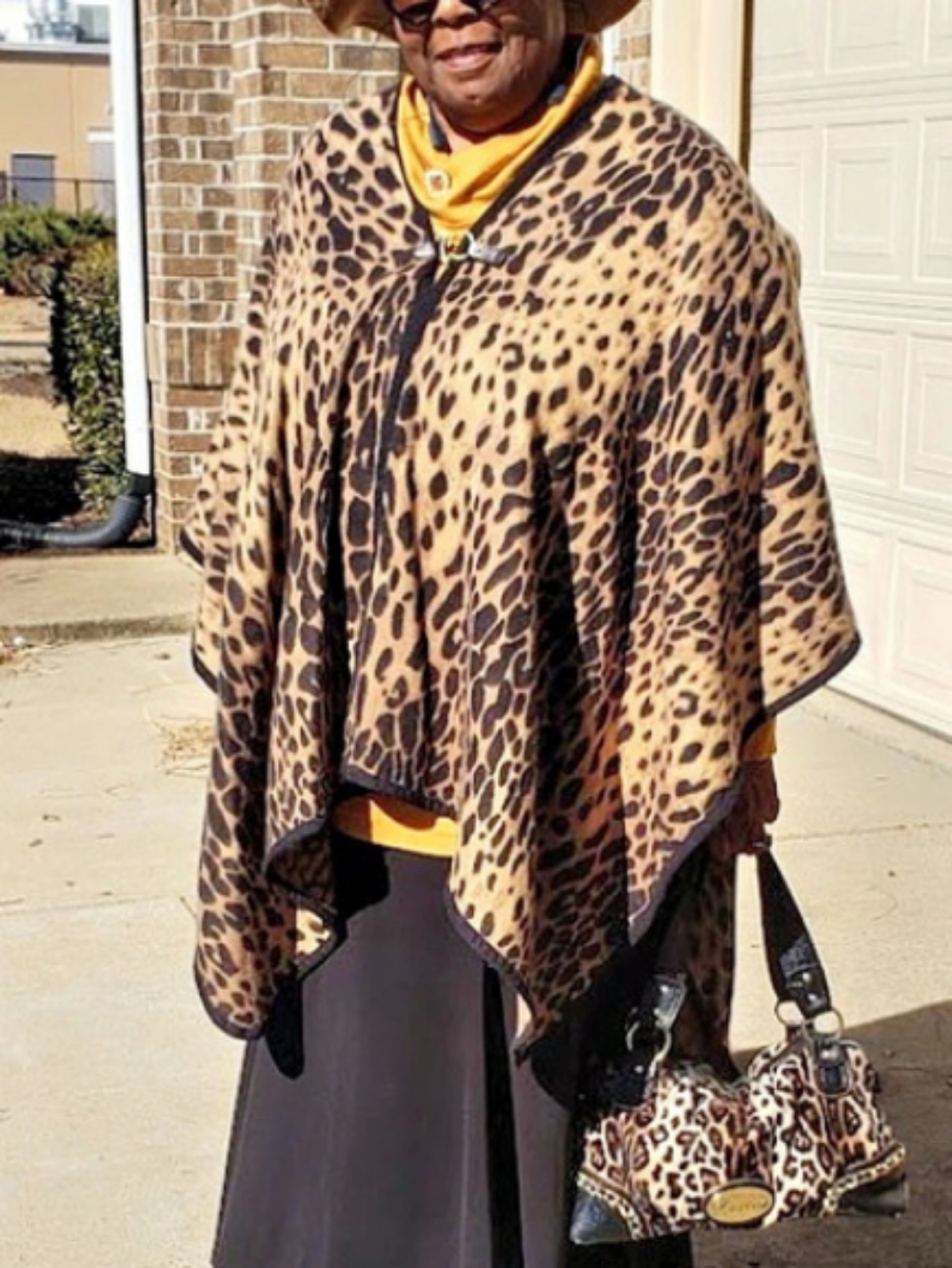 Marc New York leopard-print poncho features leather trim and a buckle closure OS